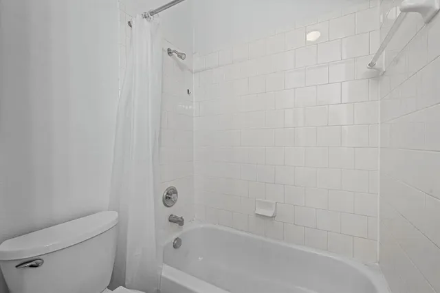 a view of a backyard with a patio