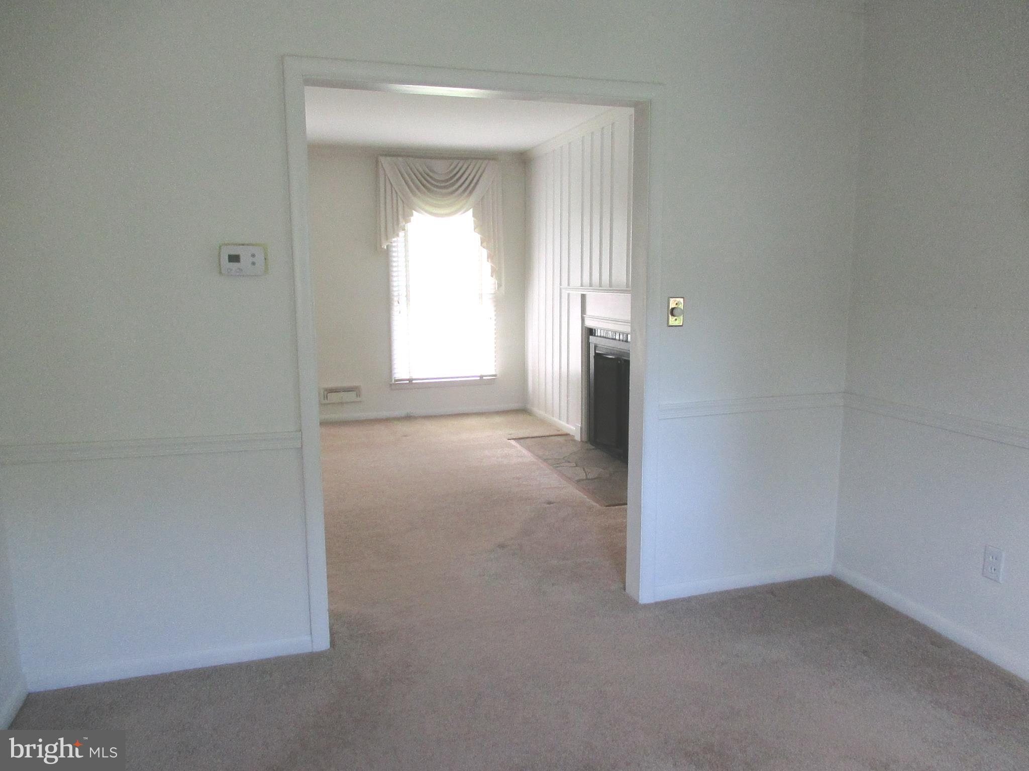 577 Brook Road Baltimore, MD 21286 - Photo 6 of 30 View into living room from dining room