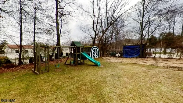 a view of outdoor space with a tree