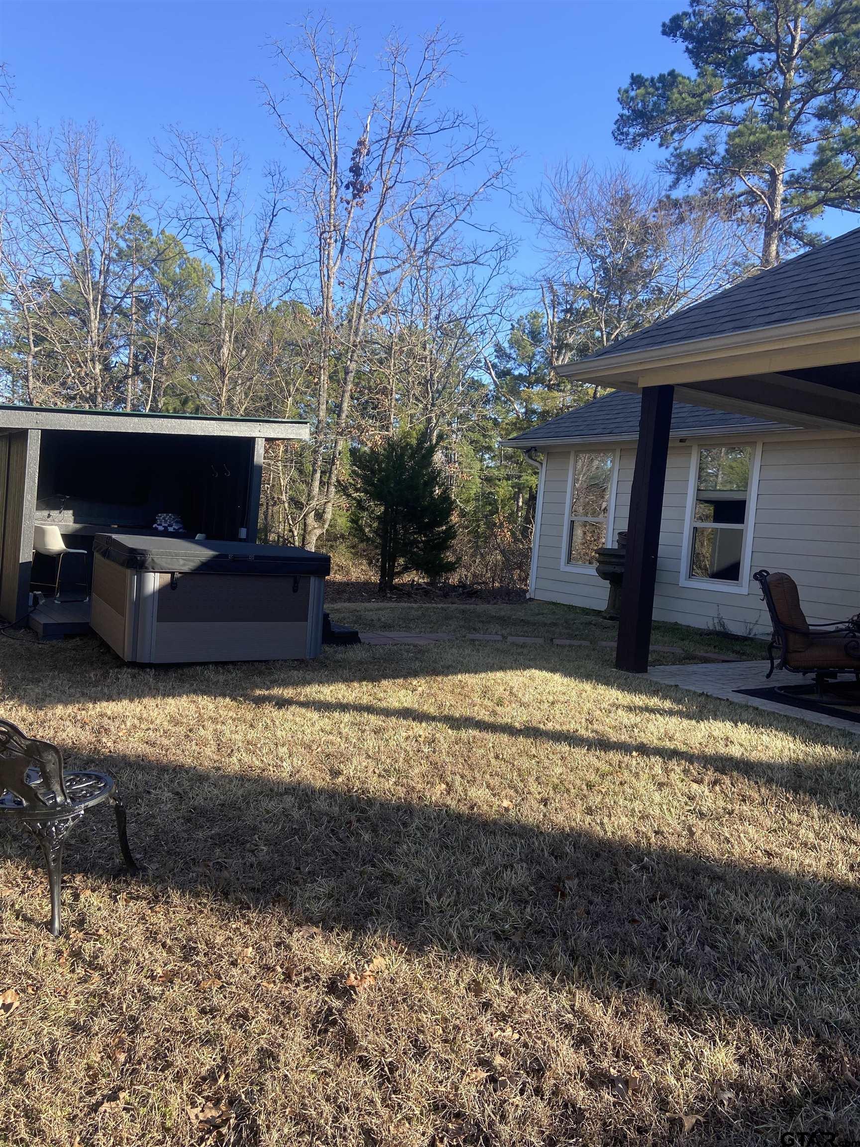 16864 Easy Street Flint, TX 75762 - Photo 32 of 37 a view of a house with a yard