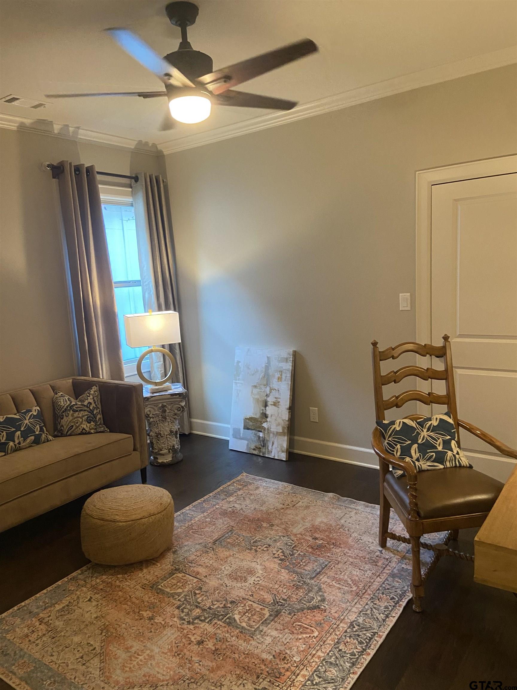 16864 Easy Street Flint, TX 75762 - Photo 10 of 37 a living room with furniture and a chandelier
