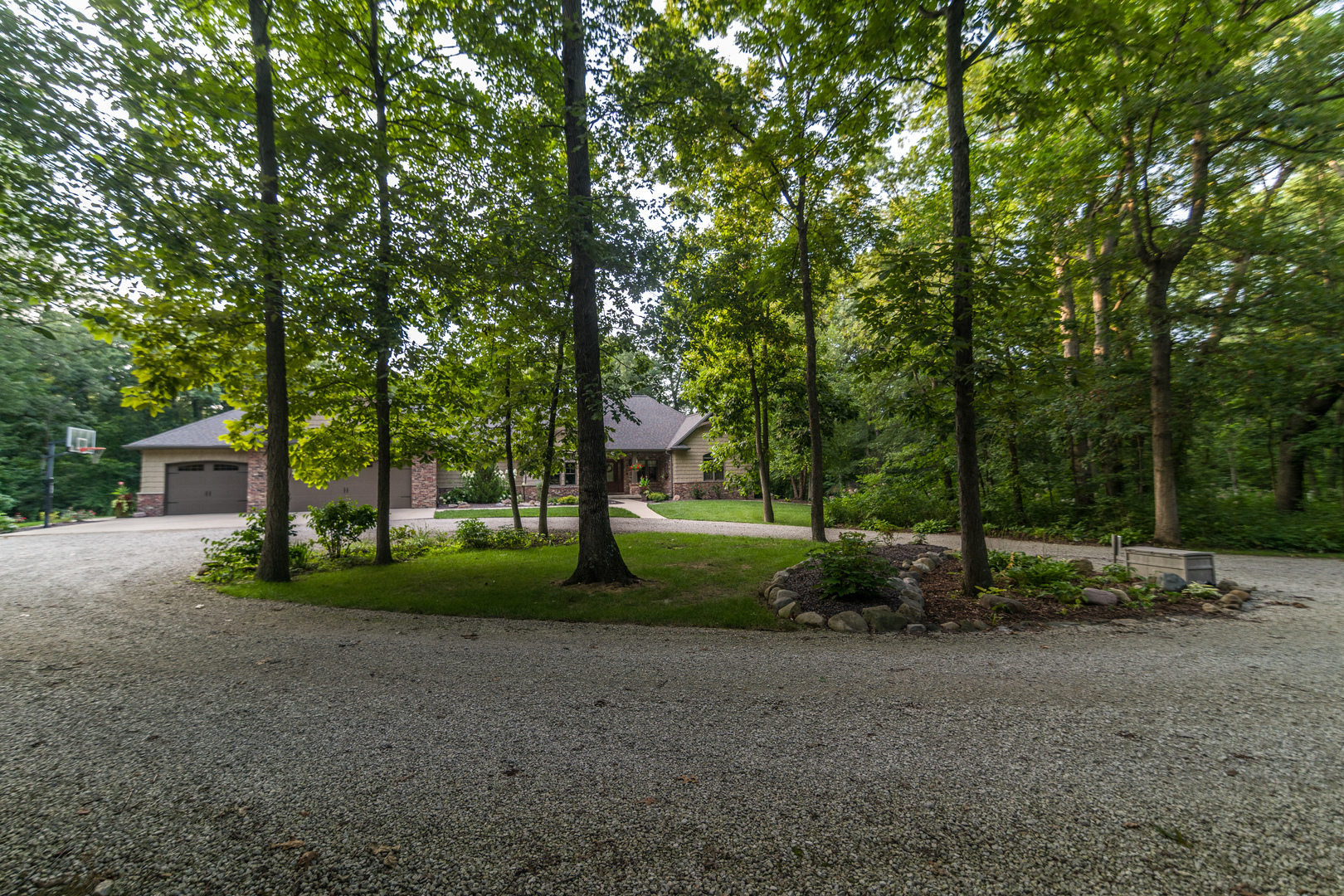 6690 Little Galilee Road Clinton, IL 61727 - Photo 13 of 53 a view of a house with large trees