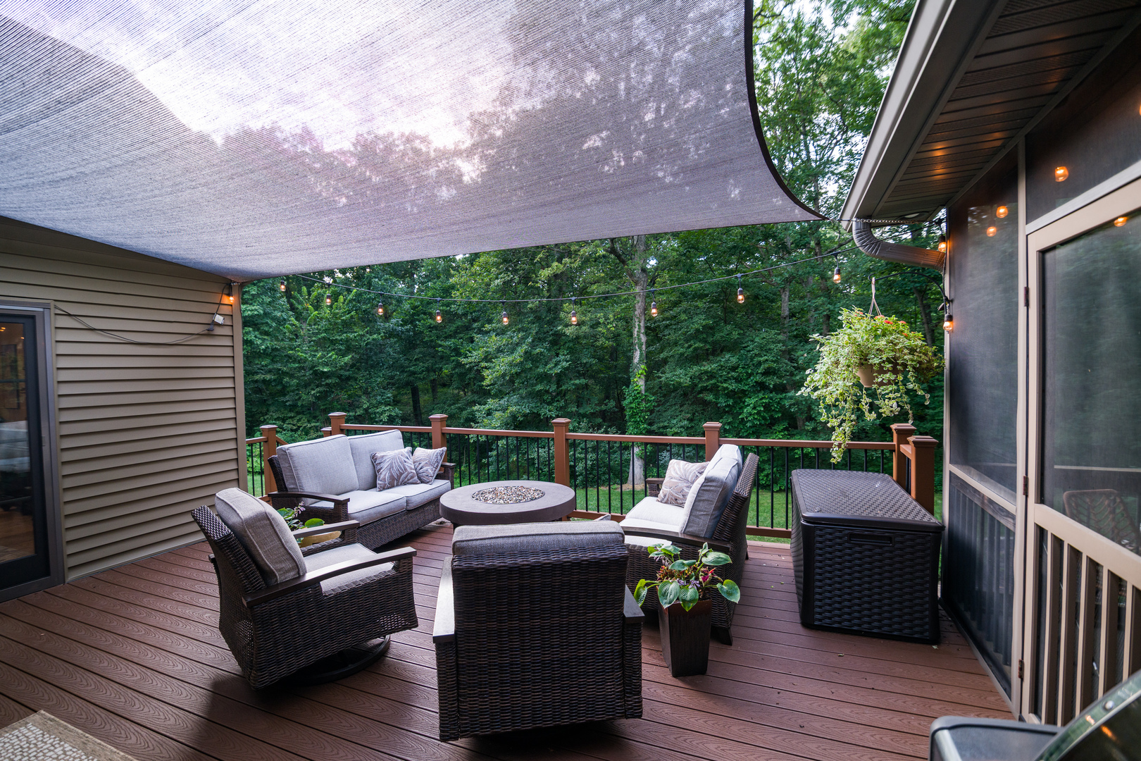6690 Little Galilee Road Clinton, IL 61727 - Photo 15 of 53 a view of a patio with couches chairs and wooden floor