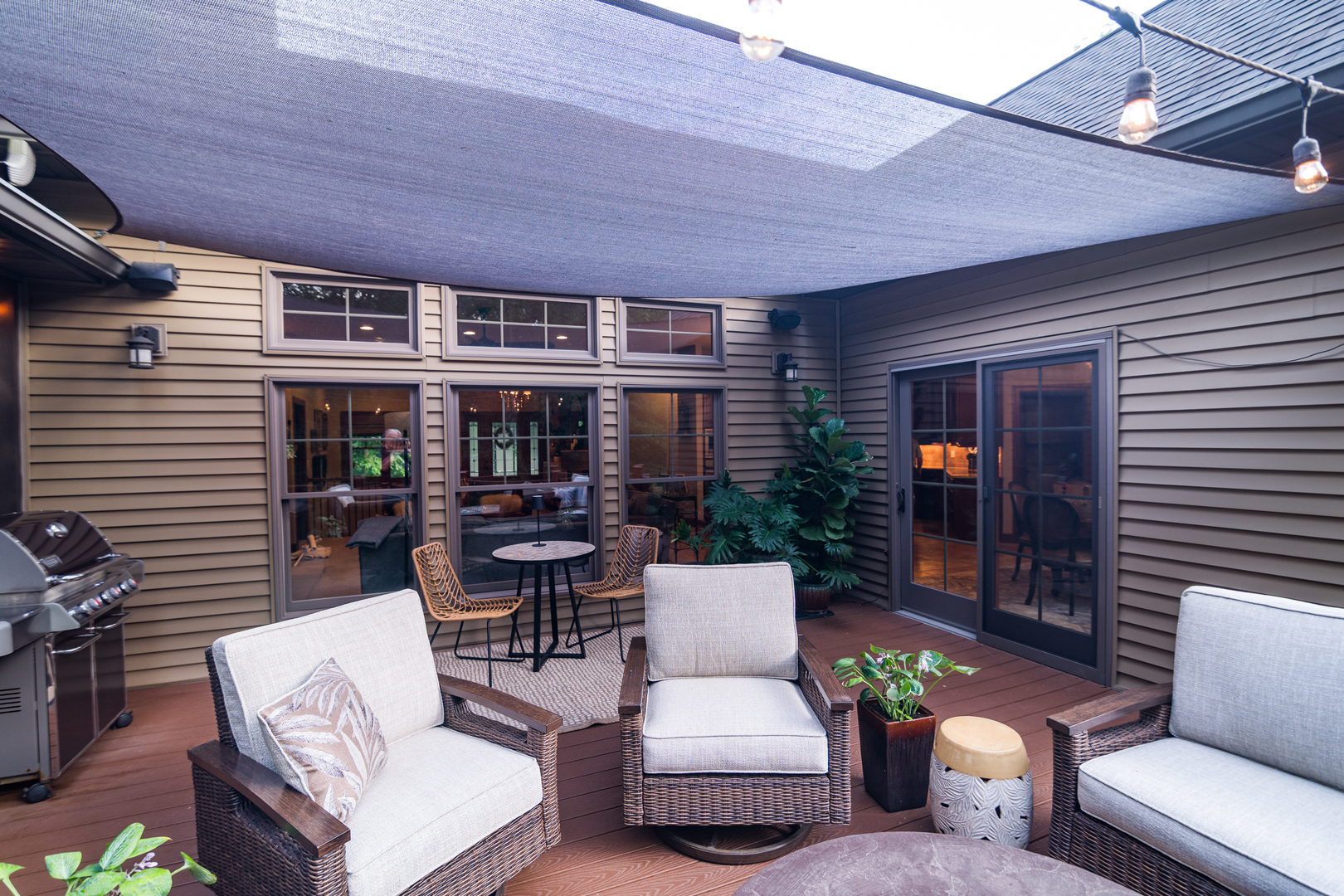 6690 Little Galilee Road Clinton, IL 61727 - Photo 16 of 53 a outdoor living space with patio furniture and potted plants