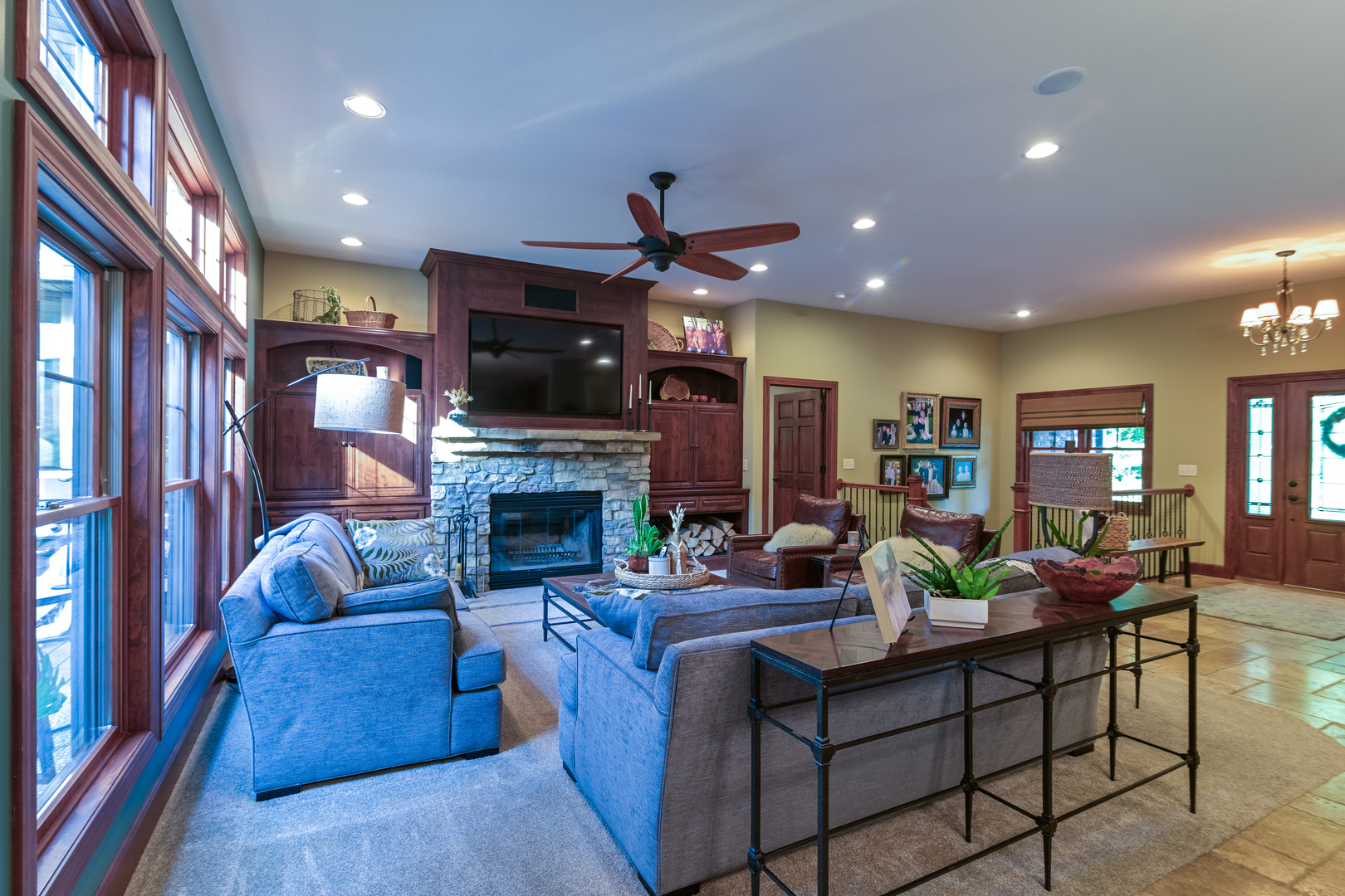 6690 Little Galilee Road Clinton, IL 61727 - Photo 23 of 53 a living room with furniture a flat screen tv and a fireplace