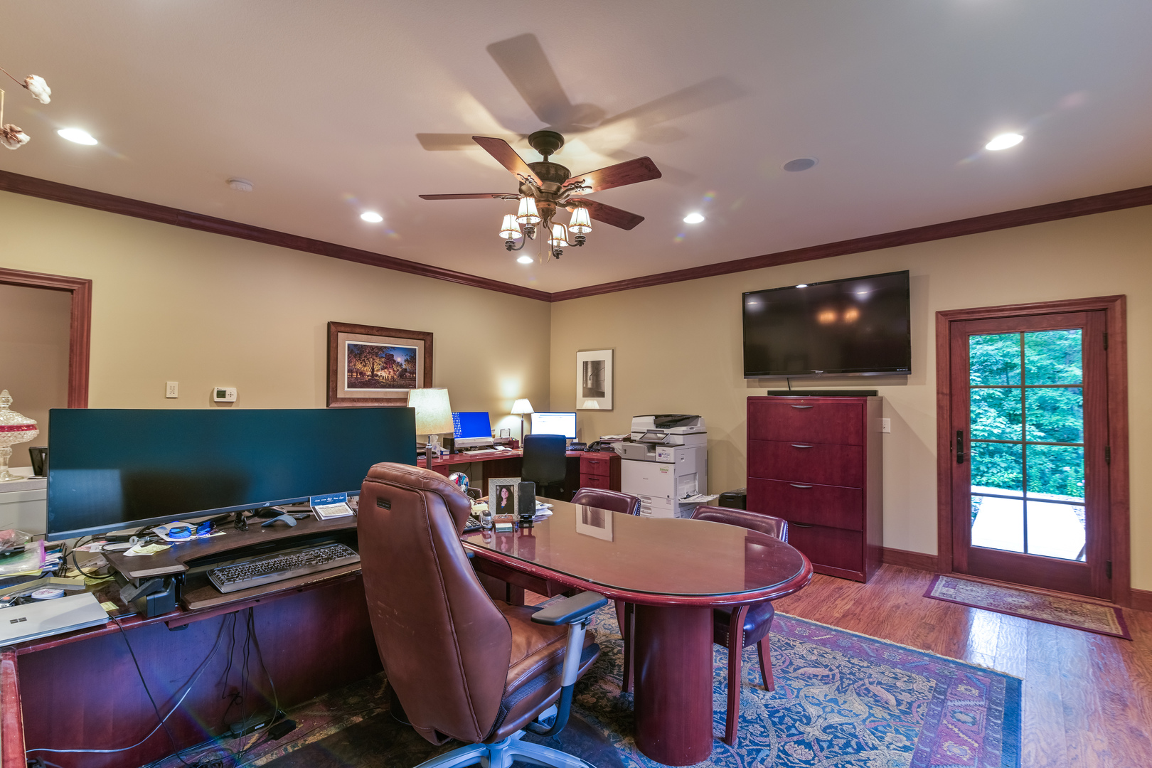 6690 Little Galilee Road Clinton, IL 61727 - Photo 39 of 53 a workspace with furniture a rug and a chandelier