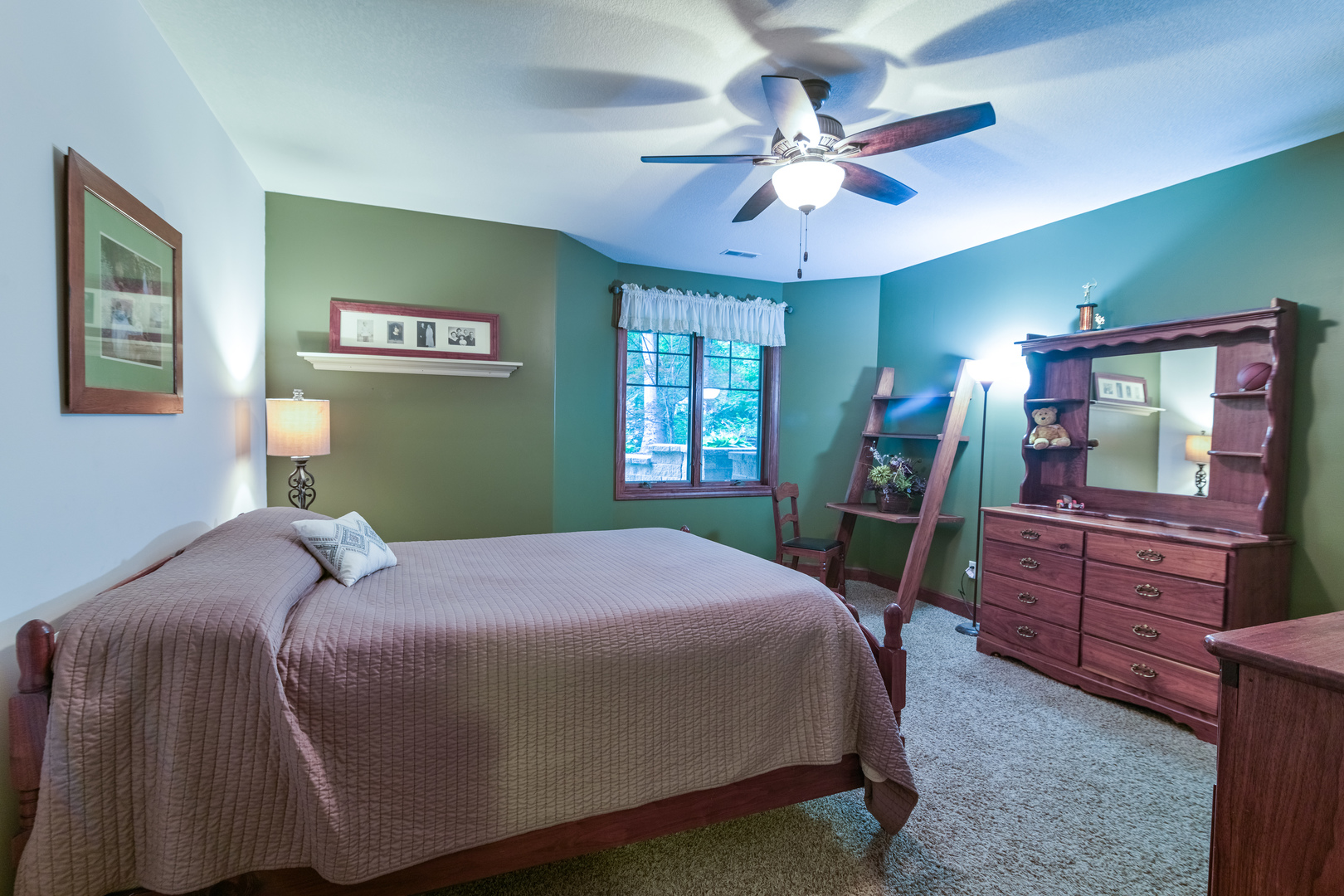6690 Little Galilee Road Clinton, IL 61727 - Photo 51 of 53 a bedroom with a bed and a dresser