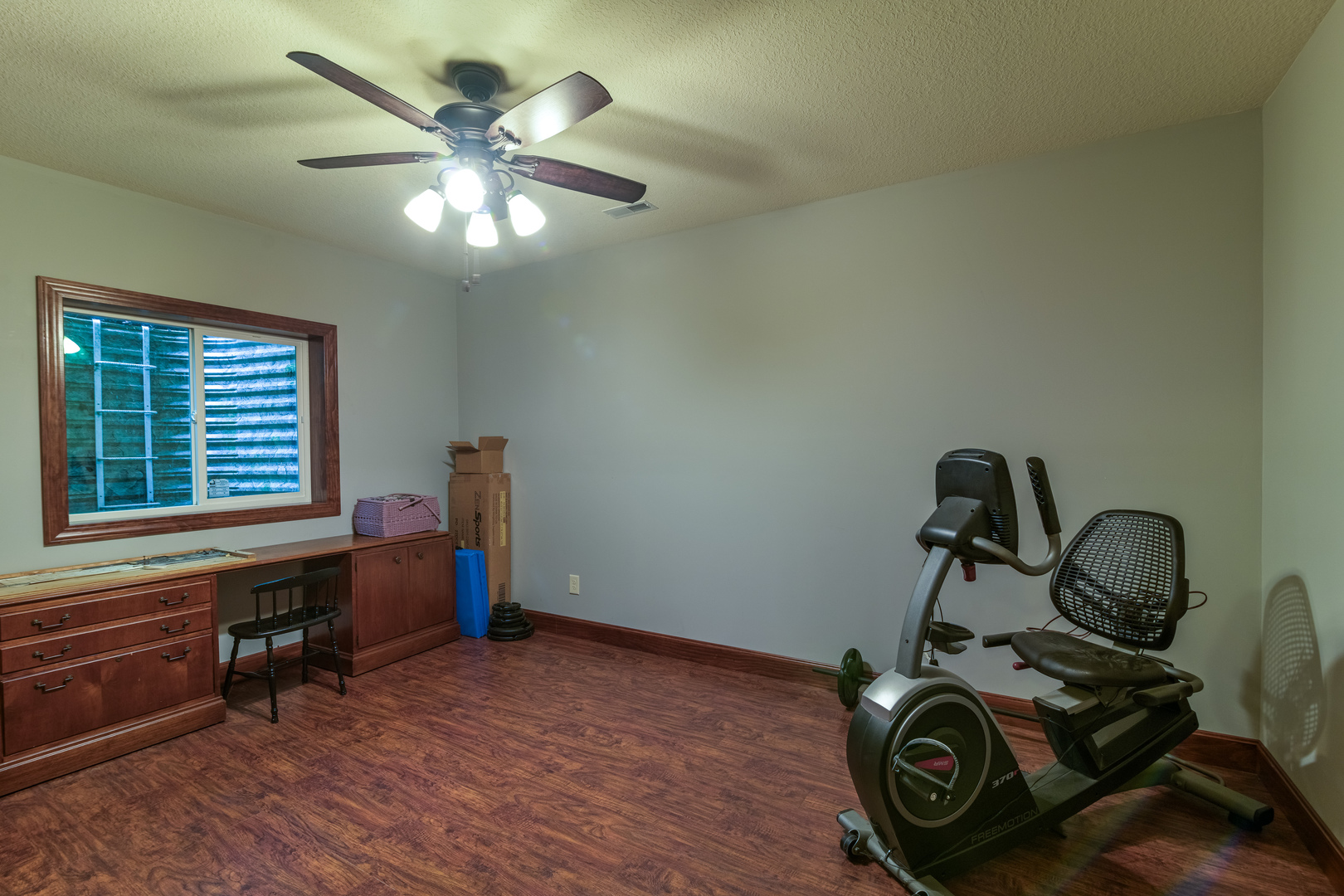6690 Little Galilee Road Clinton, IL 61727 - Photo 52 of 53 a view of a workspace with furniture and a window
