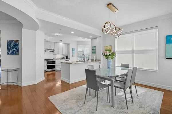 a bathroom with a bathtub a sink and a mirror