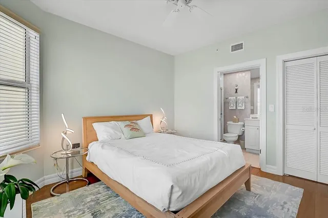 a balcony with table and chairs