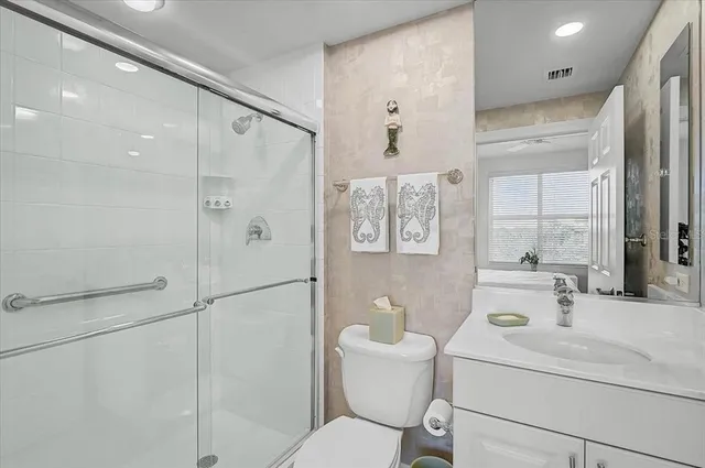 a view of a living room and floor to ceiling window