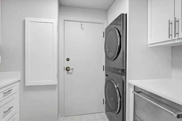 an aerial view of a house with a garden and yard