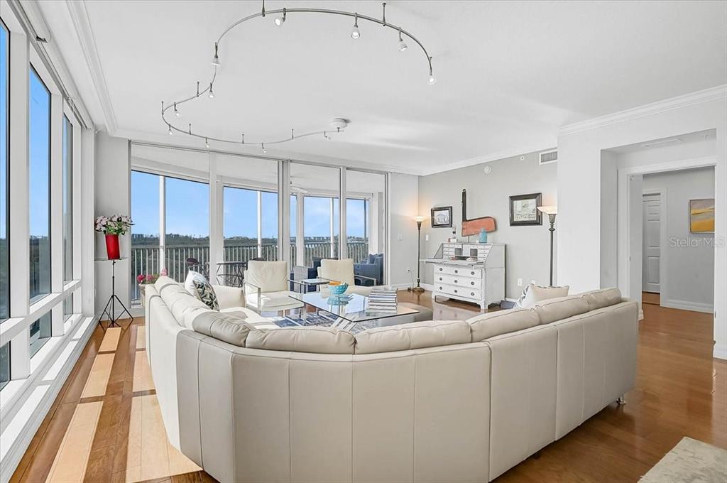 409 North Point Road, Unit 601 Osprey, FL 34229 - Photo 9 of 63 a living room with furniture and a large window