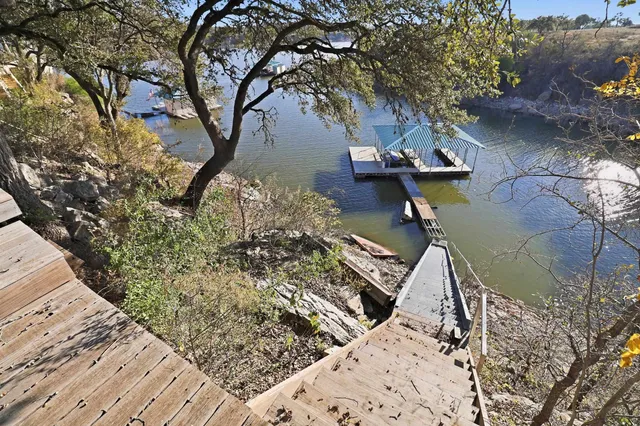 a view of a backyard of the house
