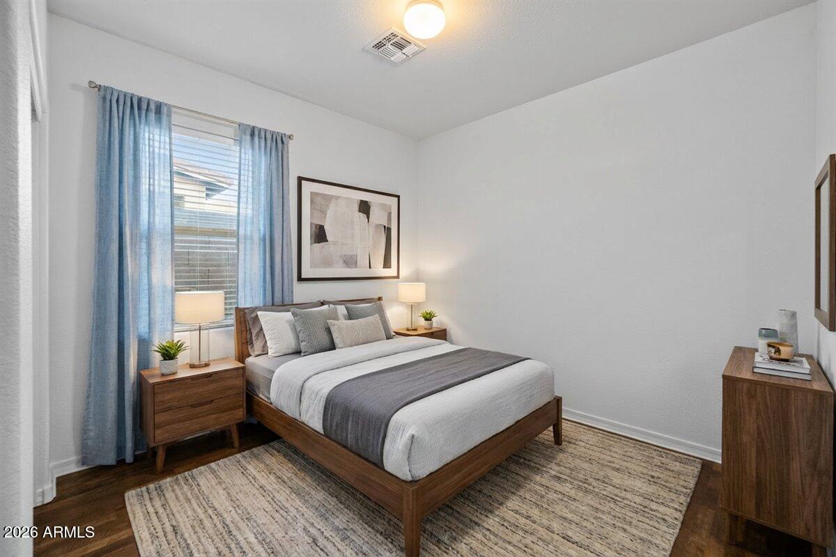 4366 West White Canyon Road San Tan Valley, AZ 85144 - Photo 23 of 35 a bedroom with a bed lamp on table and a window