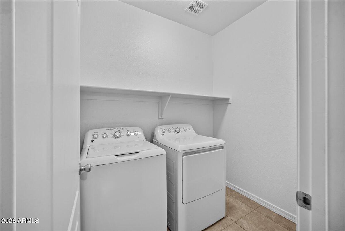 4366 West White Canyon Road San Tan Valley, AZ 85144 - Photo 26 of 35 a utility room with dryer and washer