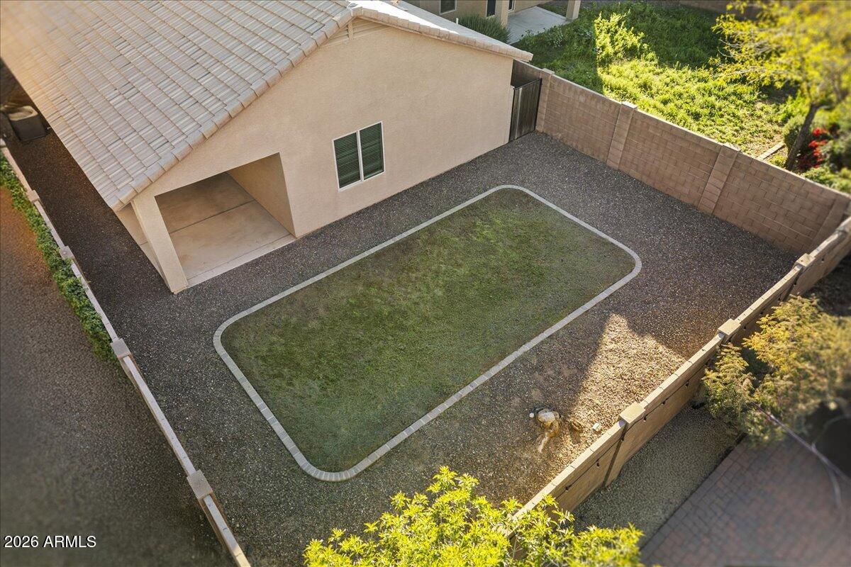4366 West White Canyon Road San Tan Valley, AZ 85144 - Photo 5 of 35 a view of a balcony with floor to ceiling windows and wooden fence