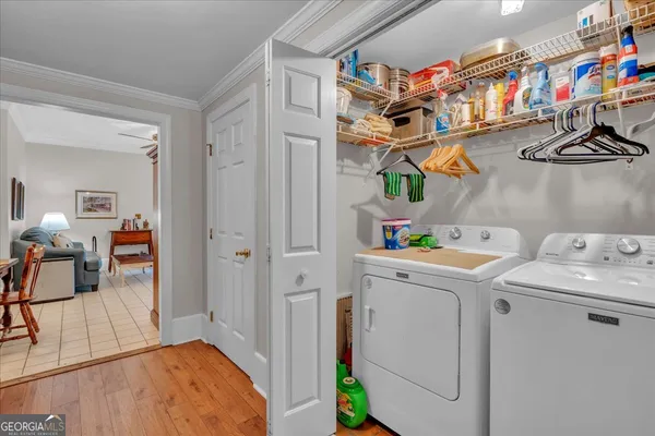 a bedroom with a bed and ceiling fan