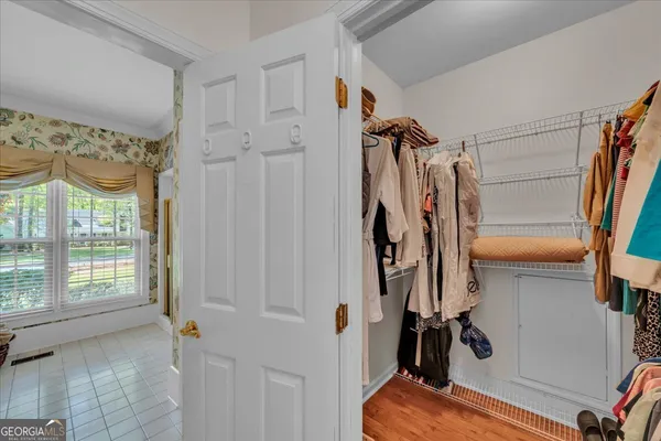 a patio with yard table and chairs