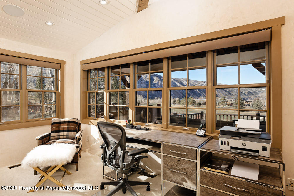 14 Arbaney Ranch Road Basalt, CO 81621 - Photo 11 of 29 a living room filled with furniture and floor to ceiling windows