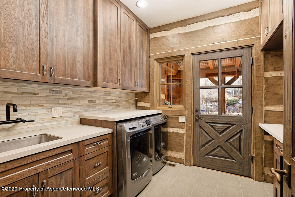14 Arbaney Ranch Road Basalt, CO 81621 - Photo 16 of 29 a kitchen with stainless steel appliances granite countertop a sink stove and cabinets
