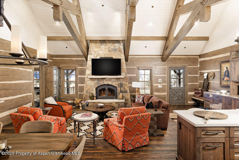 14 Arbaney Ranch Road Basalt, CO 81621 - Photo 3 of 29 a living room with fireplace furniture and a flat screen tv