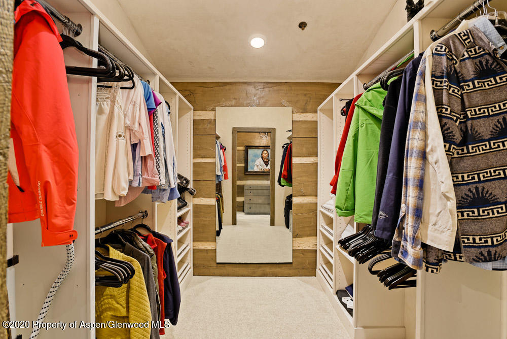 14 Arbaney Ranch Road Basalt, CO 81621 - Photo 10 of 29 a view of walk in closet with clothes and shoes