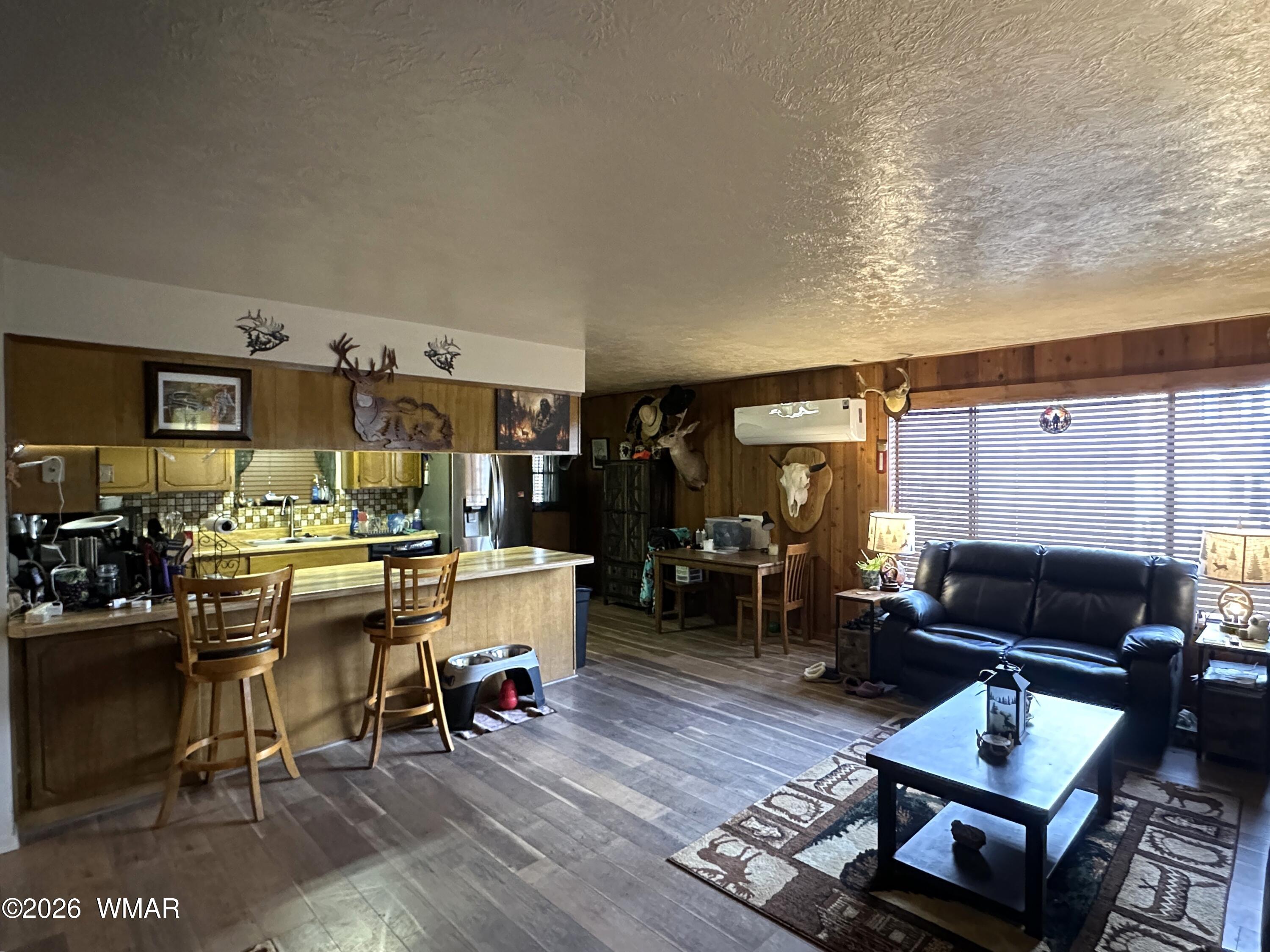 19 County Road Alpine, AZ 85920 - Photo 7 of 27 a living room with furniture and a window
