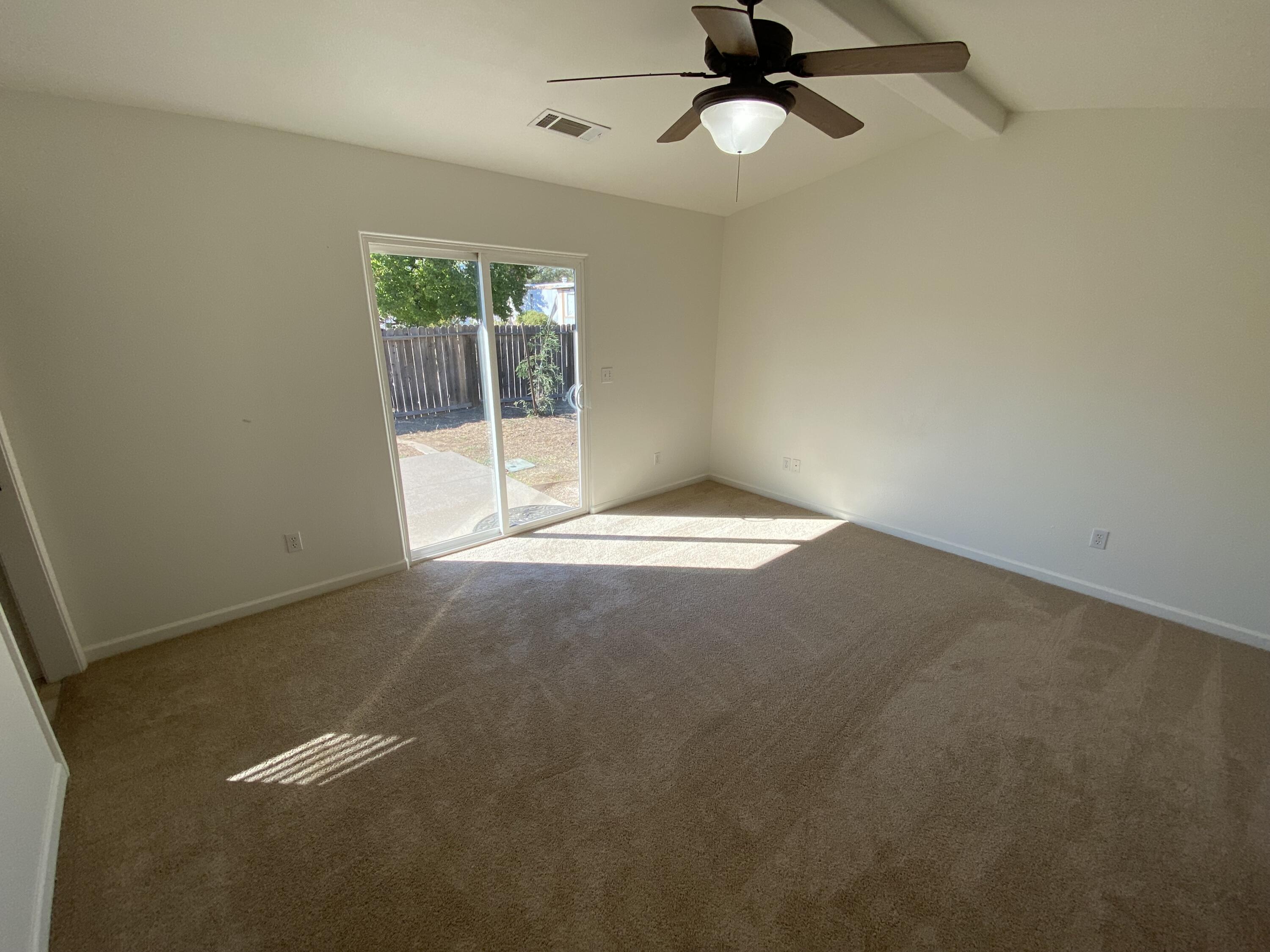 18602 Old Oasis Road Redding, CA 96003 - Photo 11 of 23 a view of an empty room with a window
