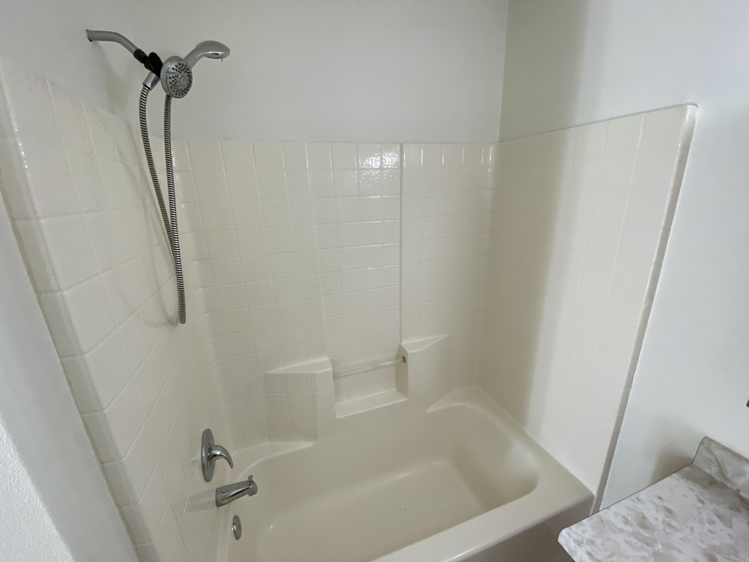 18602 Old Oasis Road Redding, CA 96003 - Photo 13 of 23 a close view of a bathtub in bathroom