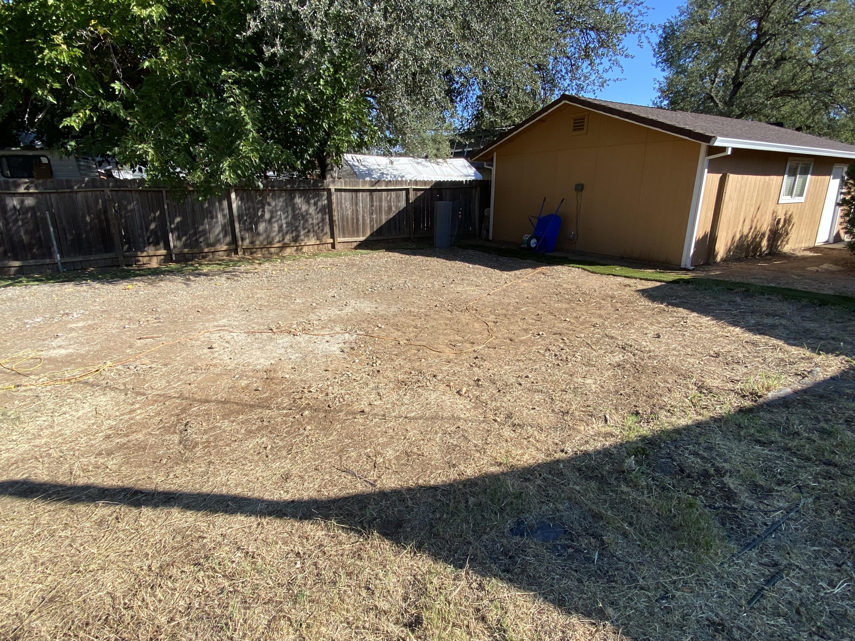 18602 Old Oasis Road Redding, CA 96003 - Photo 19 of 23 a view of wooden fence and a yard