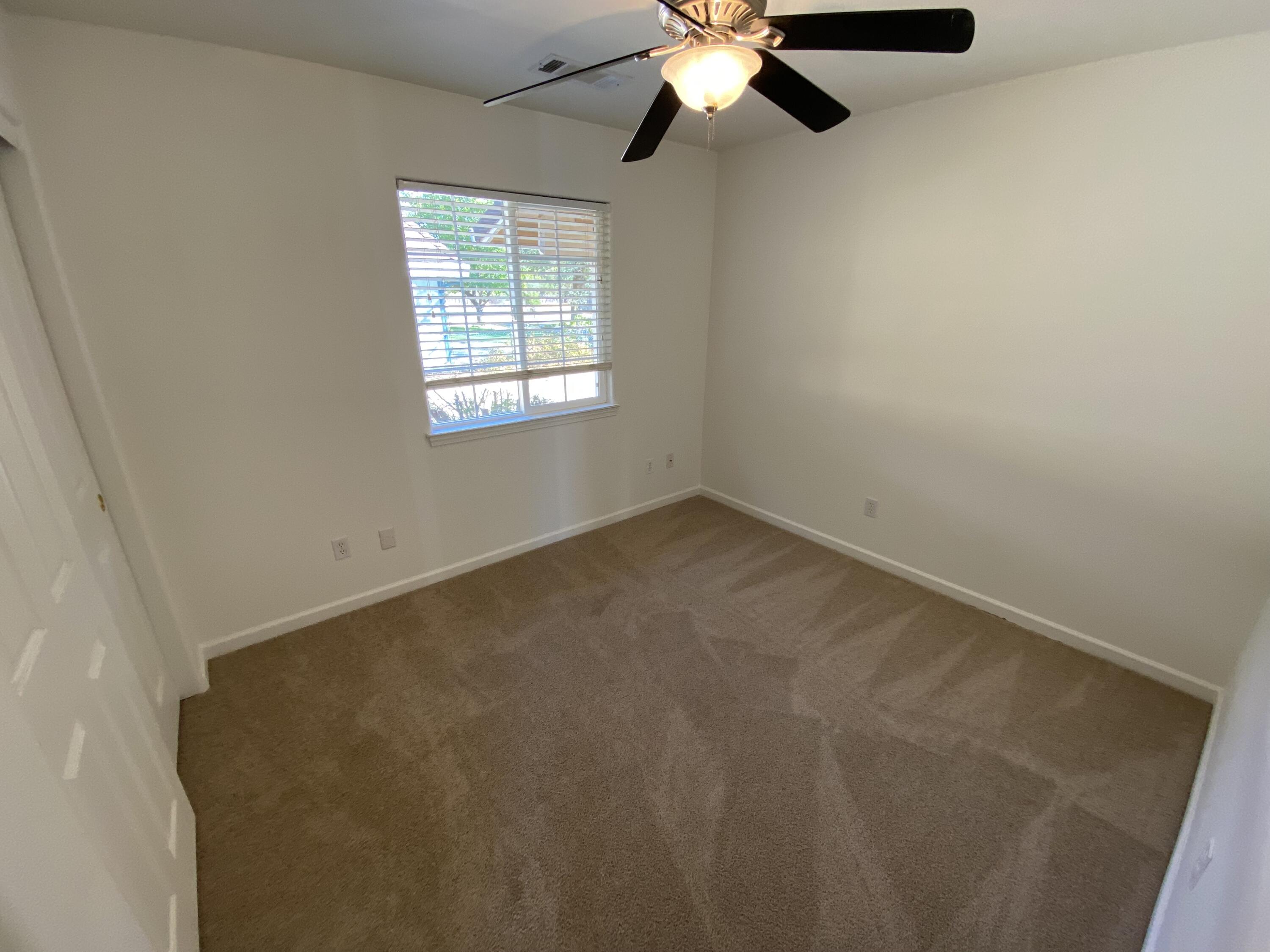 18602 Old Oasis Road Redding, CA 96003 - Photo 7 of 23 an empty room with a window
