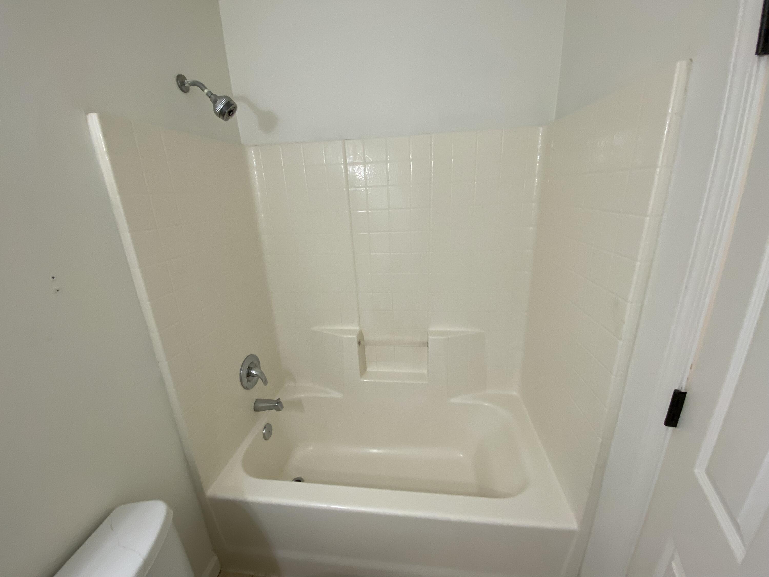 18602 Old Oasis Road Redding, CA 96003 - Photo 10 of 23 a white bath tub sitting next to a white toilet