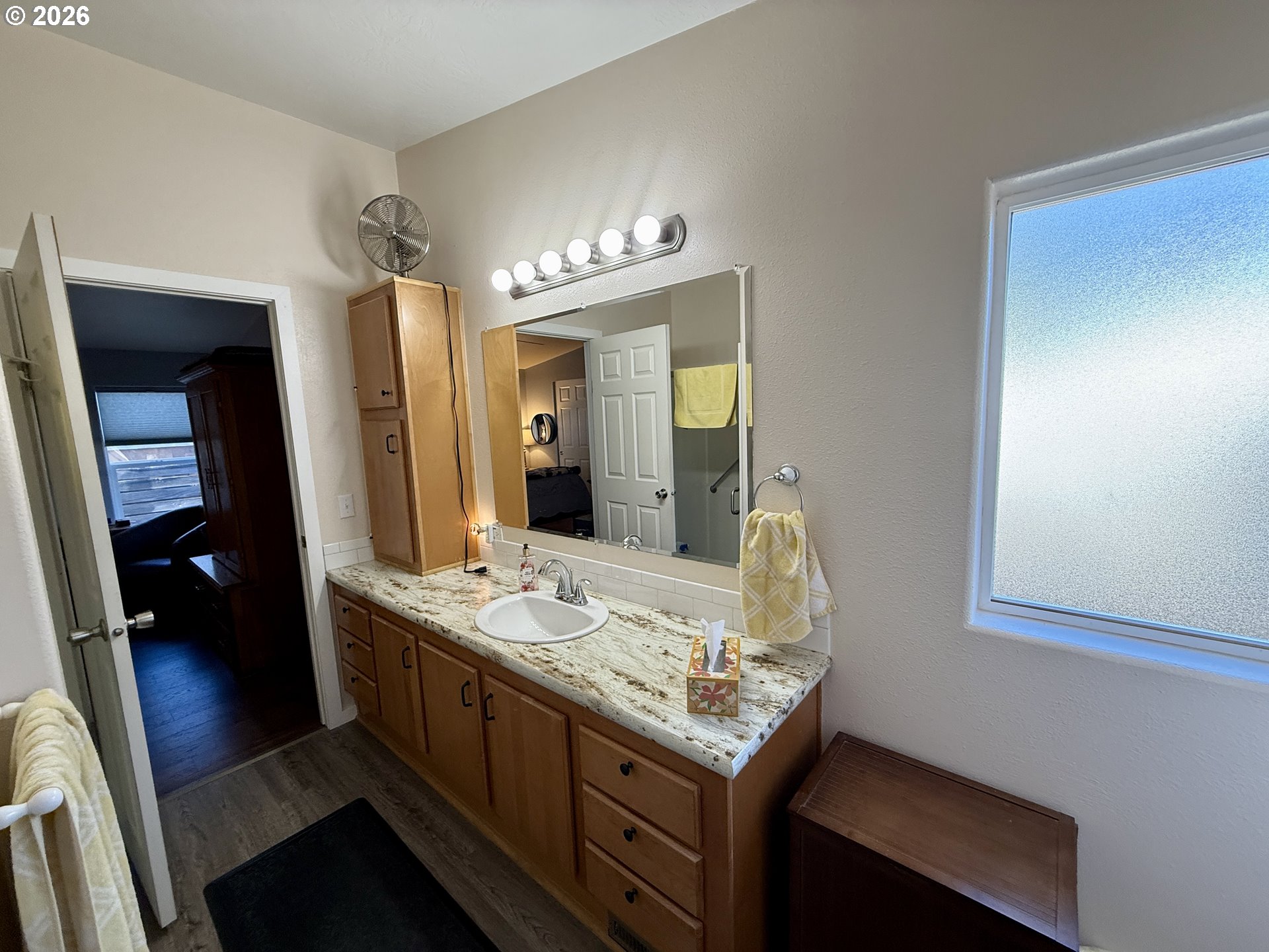 3050 Knott Terrace Coos Bay, OR 97420 - Photo 14 of 24 a bathroom with a sink and a mirror