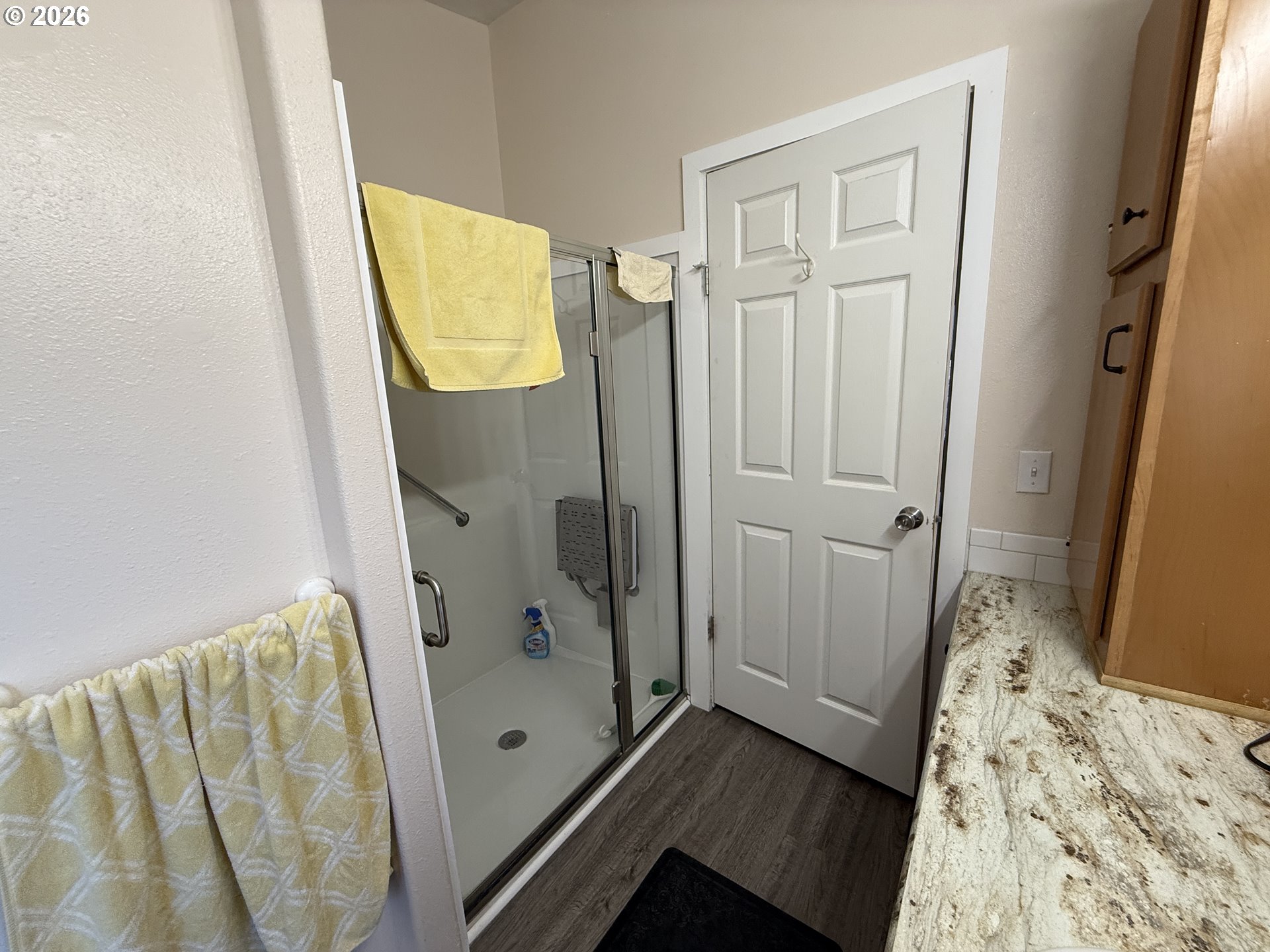 3050 Knott Terrace Coos Bay, OR 97420 - Photo 15 of 24 a bathroom with a tub and a shower