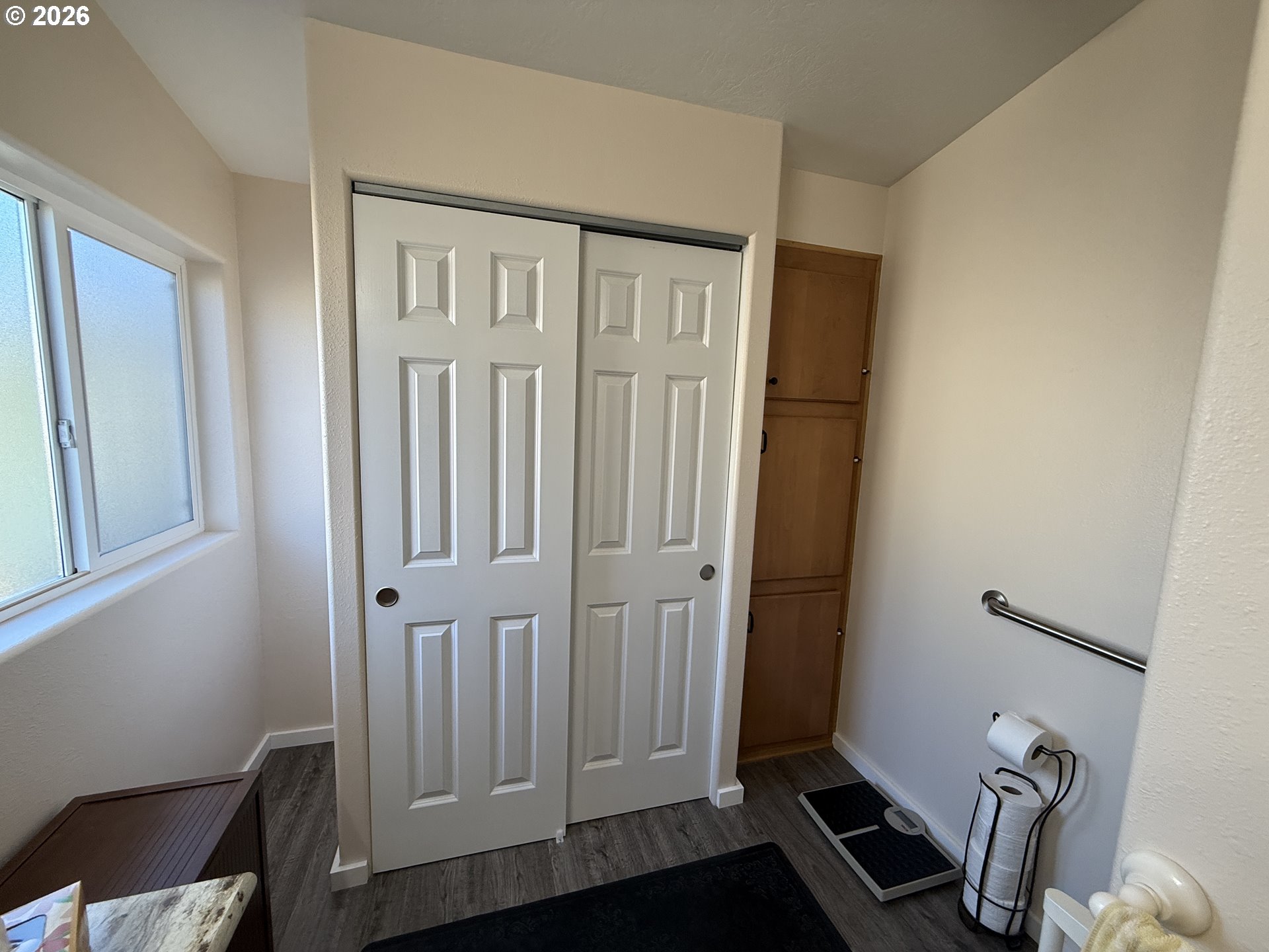 3050 Knott Terrace Coos Bay, OR 97420 - Photo 16 of 24 a view of entryway with wooden floor