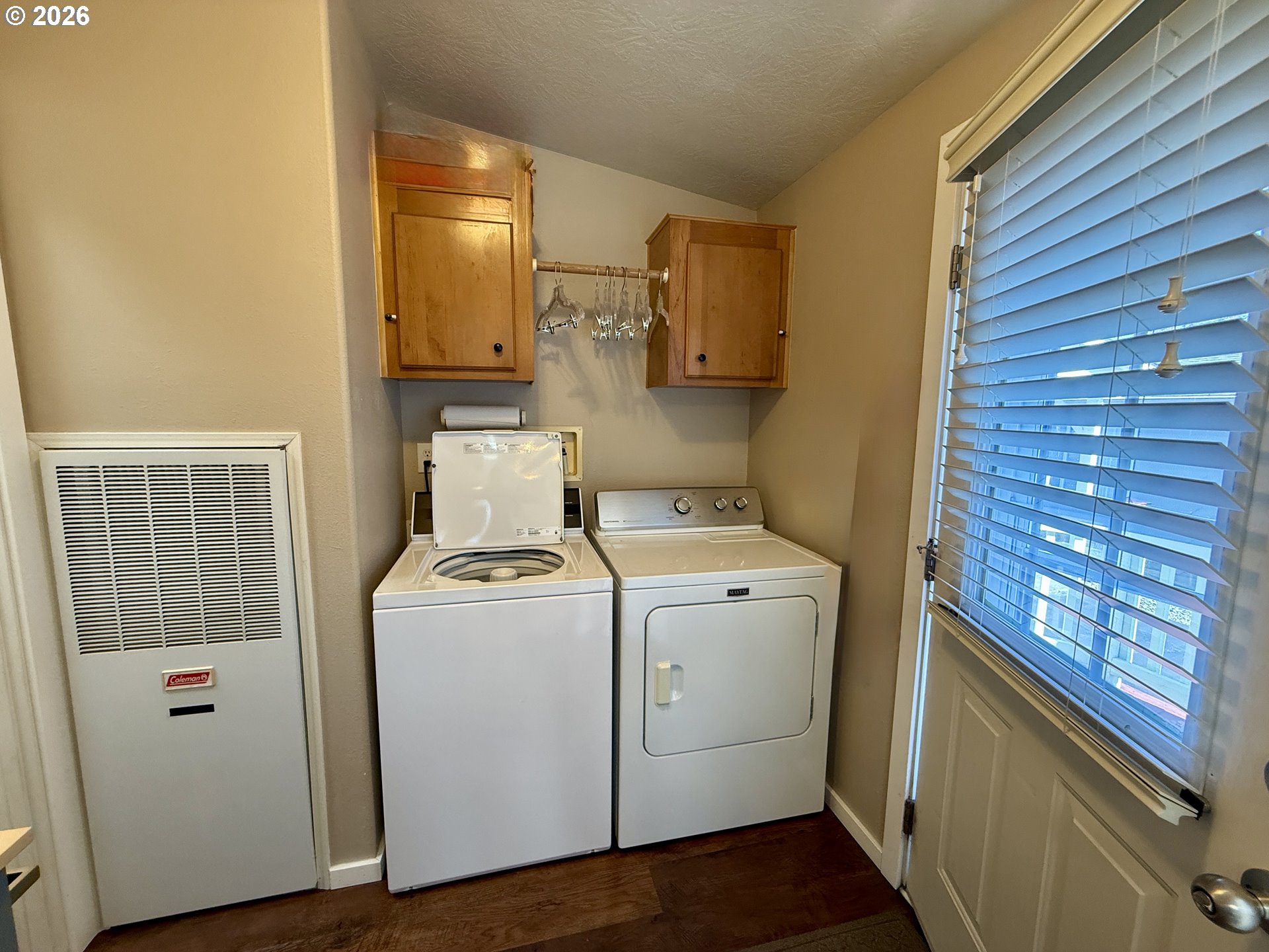 3050 Knott Terrace Coos Bay, OR 97420 - Photo 24 of 24 a view of a storage & utility room with washer and dryer