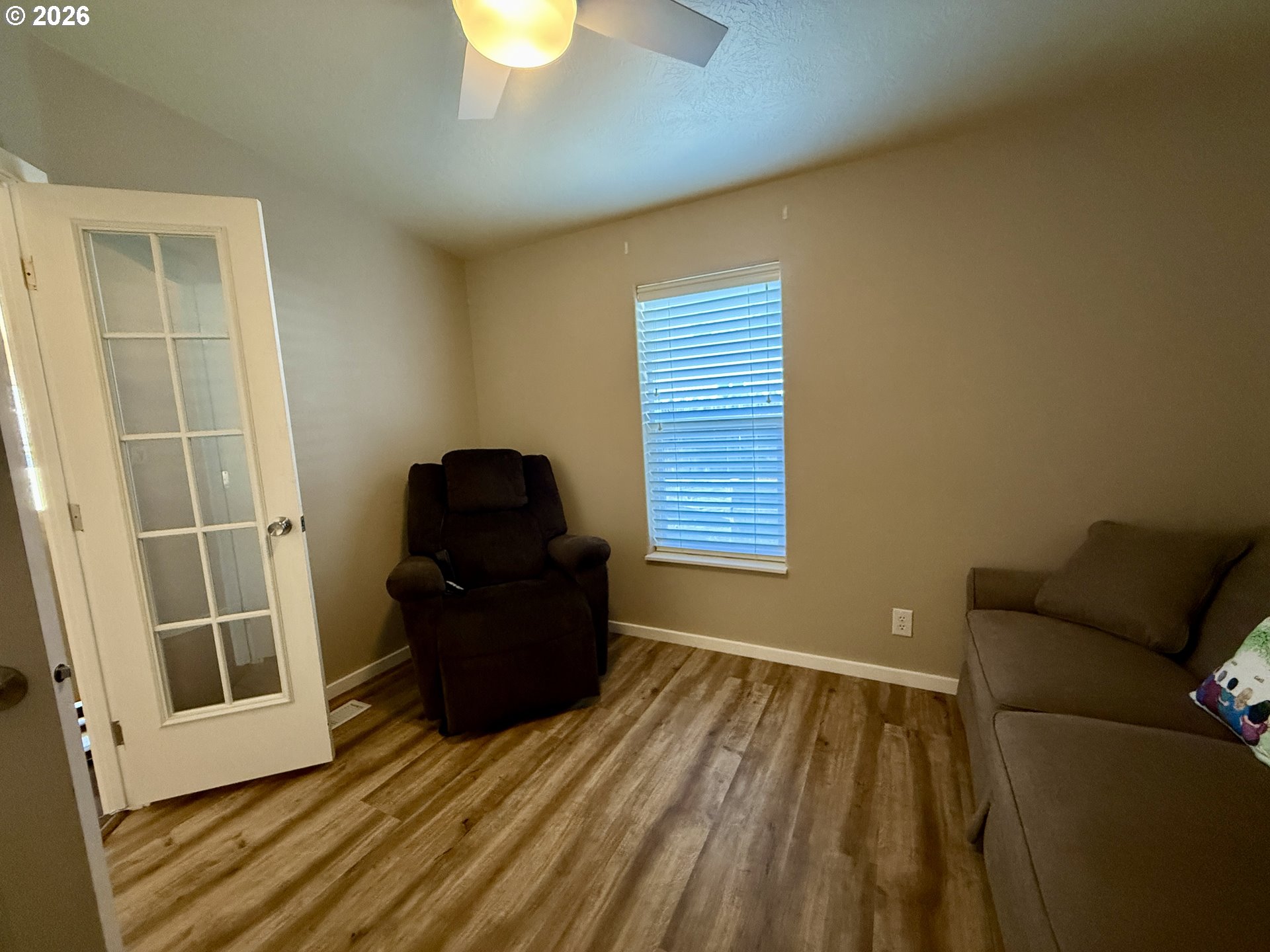 3050 Knott Terrace Coos Bay, OR 97420 - Photo 8 of 24 a living room with a couch and a window