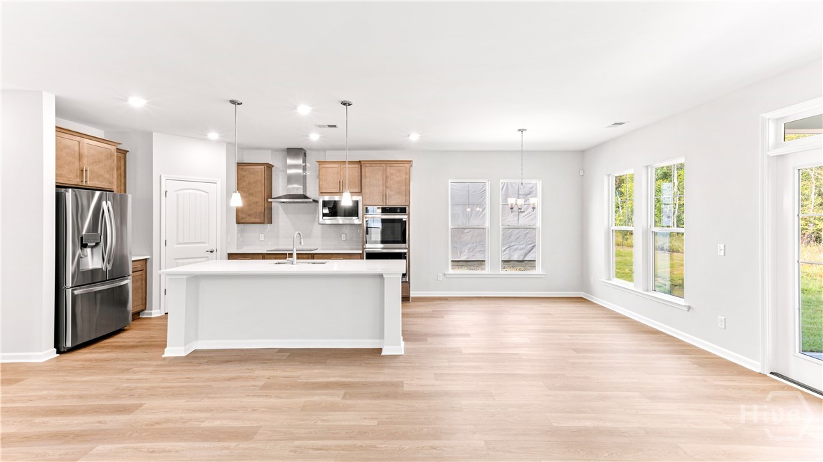 148 Como Drive Pooler, GA 31322 - Photo 10 of 41 Beautiful kitchen with quartz countertops and gourmet kitchen appliances including a double oven w/ a built-in air fryer!