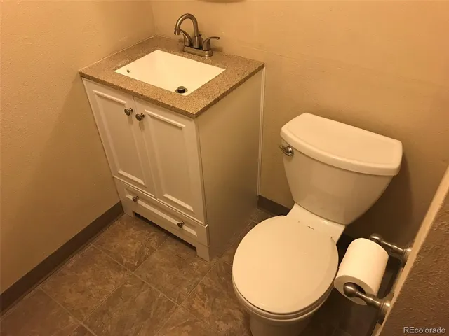 a bathroom with a sink and a toilet