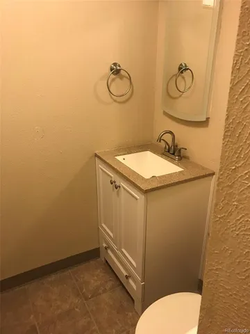 a bathroom with a sink and a toilet