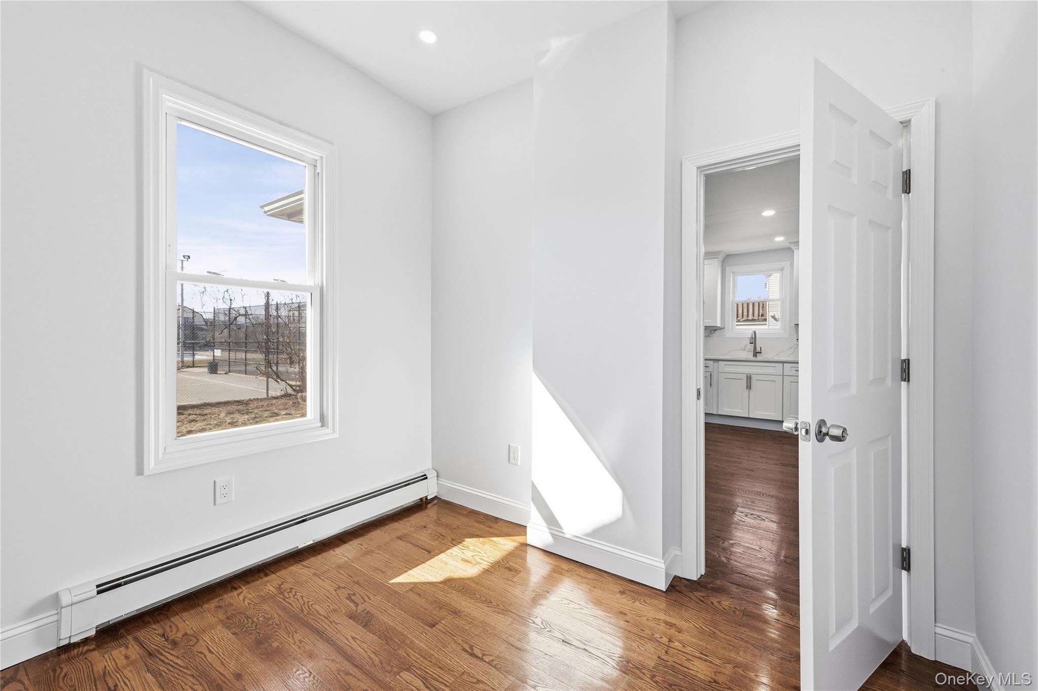 22 Colonial Avenue Freeport, NY 11520 - Photo 25 of 41 a view of a hallway with front door