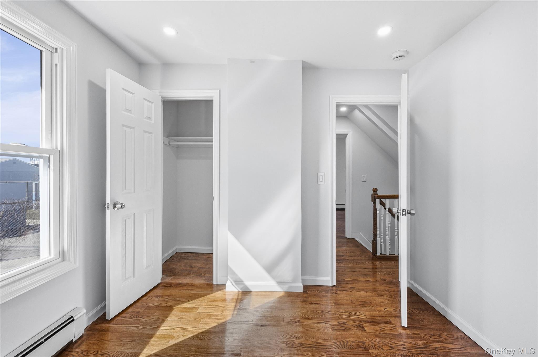 22 Colonial Avenue Freeport, NY 11520 - Photo 35 of 41 a view of entryway with wooden floor