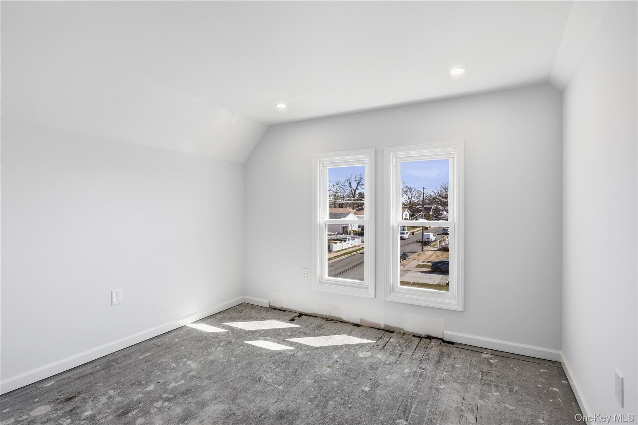 22 Colonial Avenue Freeport, NY 11520 - Photo 38 of 41 an empty room with windows