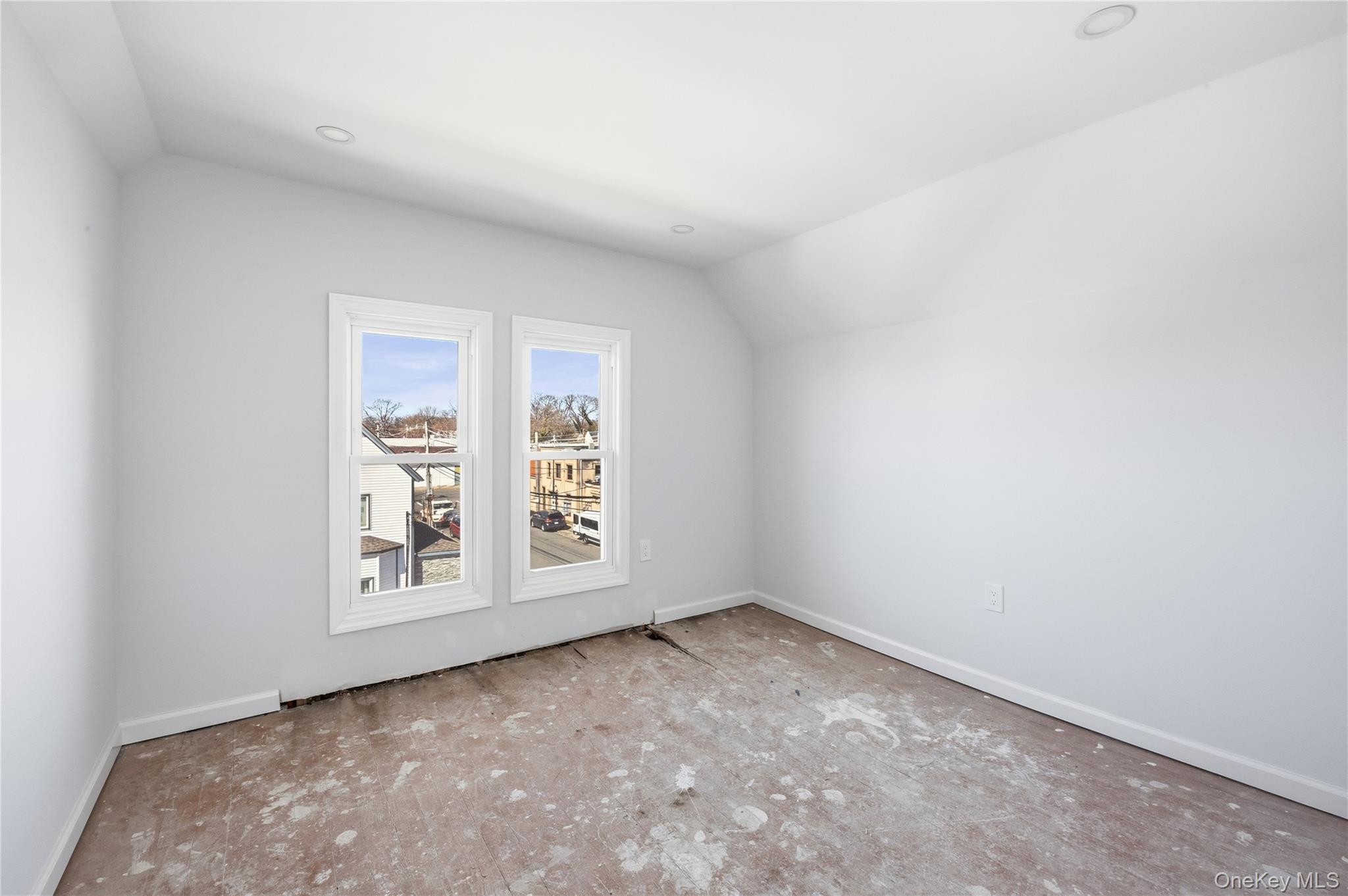 22 Colonial Avenue Freeport, NY 11520 - Photo 39 of 41 an empty room with windows and entrance
