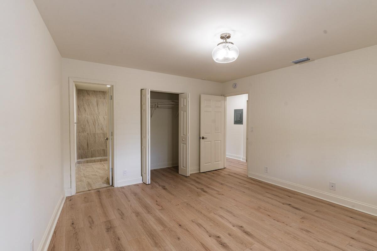 5458 Via Delray Boulevard, Unit 110 Delray Beach, FL 33484 - Photo 19 of 30 a view of hallway with wooden floor