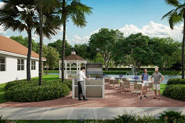 a view of a chairs and table in the backyard
