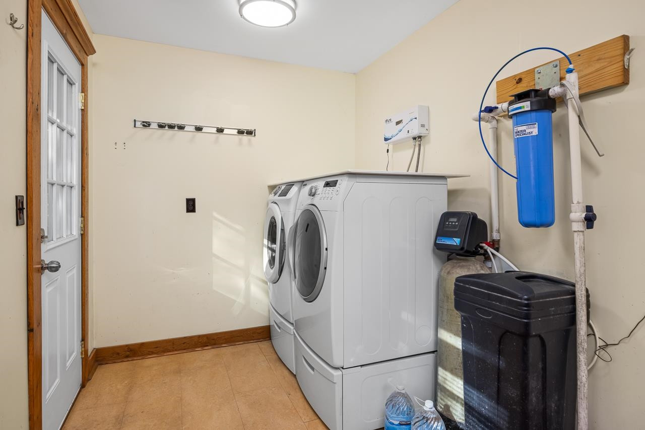 5815 Paragon Circle Durham, NC 27712 - Photo 25 of 41 a utility room with dryer and washer
