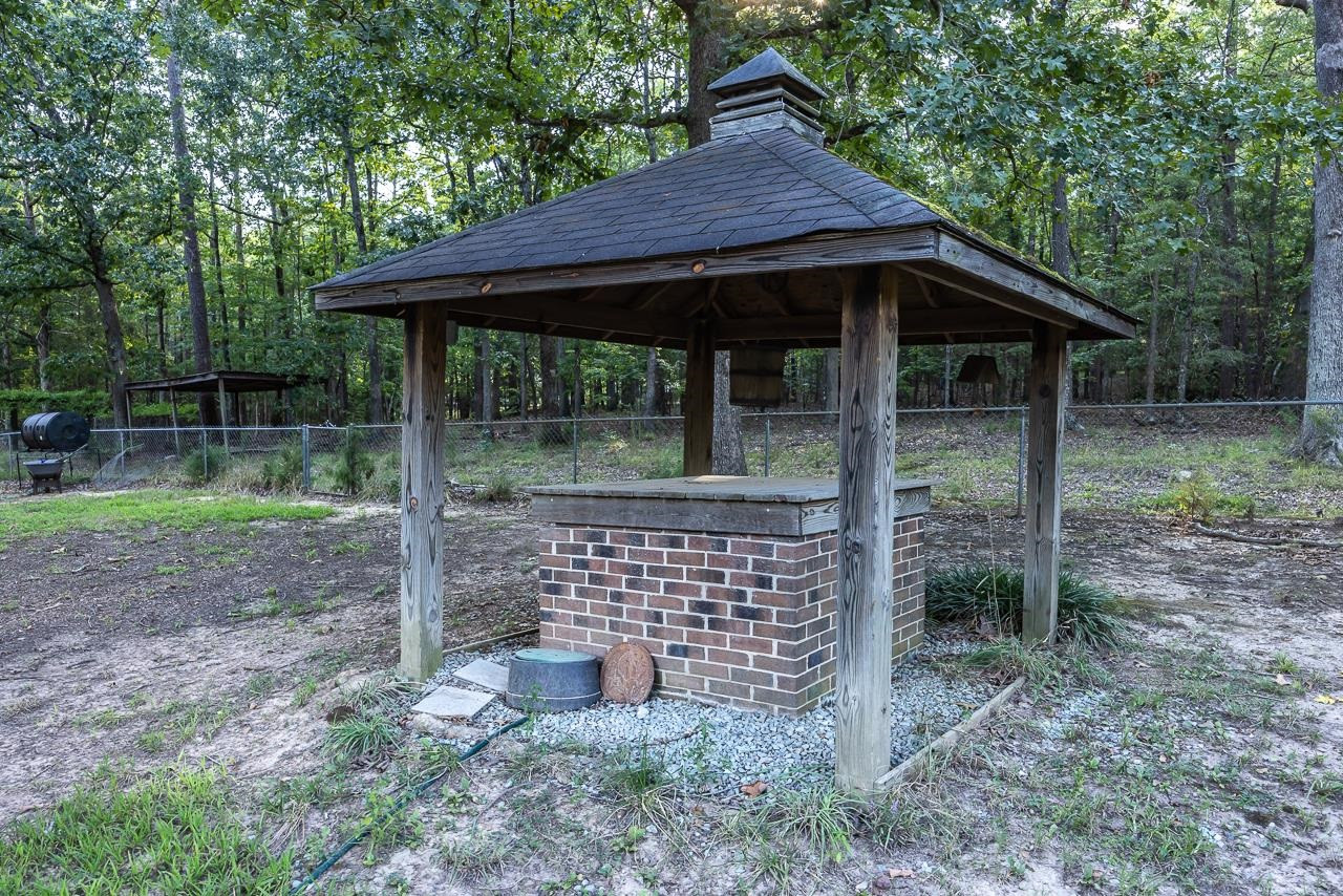 5815 Paragon Circle Durham, NC 27712 - Photo 28 of 41 a backyard of a house with seating space