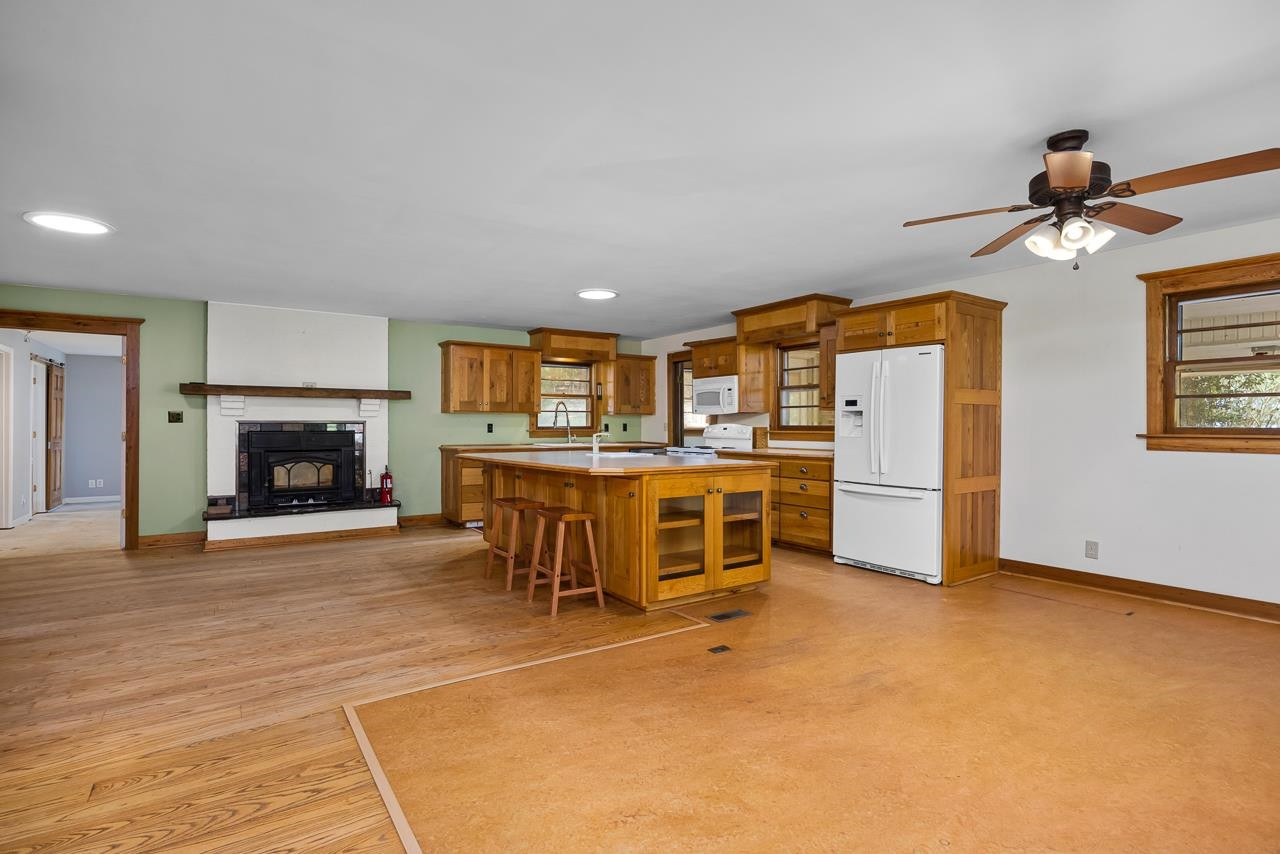 5815 Paragon Circle Durham, NC 27712 - Photo 9 of 41 a living room with furniture and a fireplace